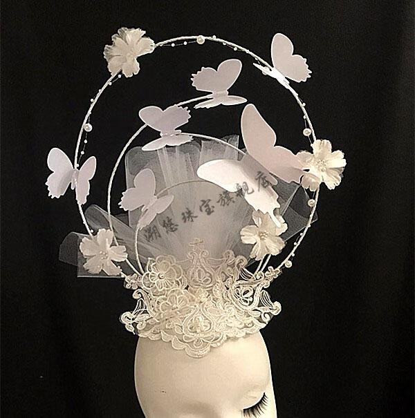 戴的白色新品蝴蝶羽毛头纱舞台模特走秀表演摄影新娘创意妆造型头饰女