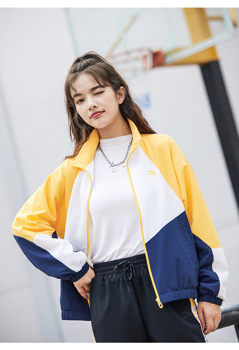 两件套安踏运动套装女2022春季新款梭织防风立领外套休闲裤黄色基础黑