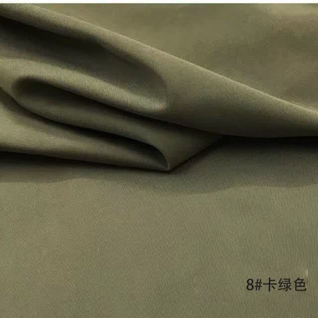聚酯纤维羽绒服布料 2021加厚风衣面料布料聚酯纤维防风防水抗皱v服