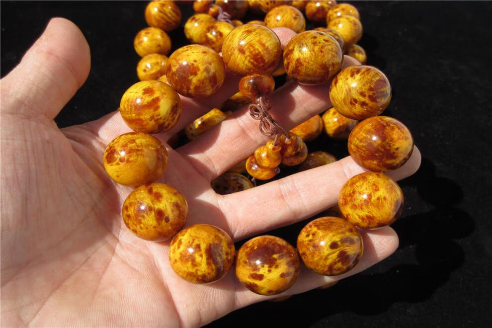 老凤凰 长白山琥珀木北沉香松明子满瘤疤全通透佛珠手串手链 收藏级满