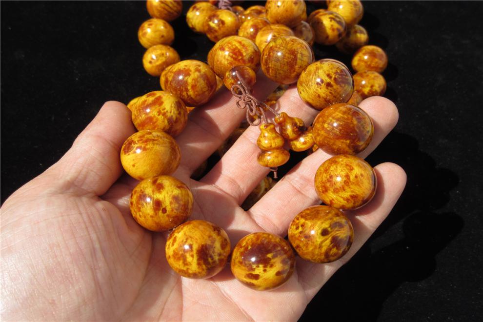 老凤凰 长白山琥珀木北沉香松明子满瘤疤全通透佛珠手串手链 收藏级满