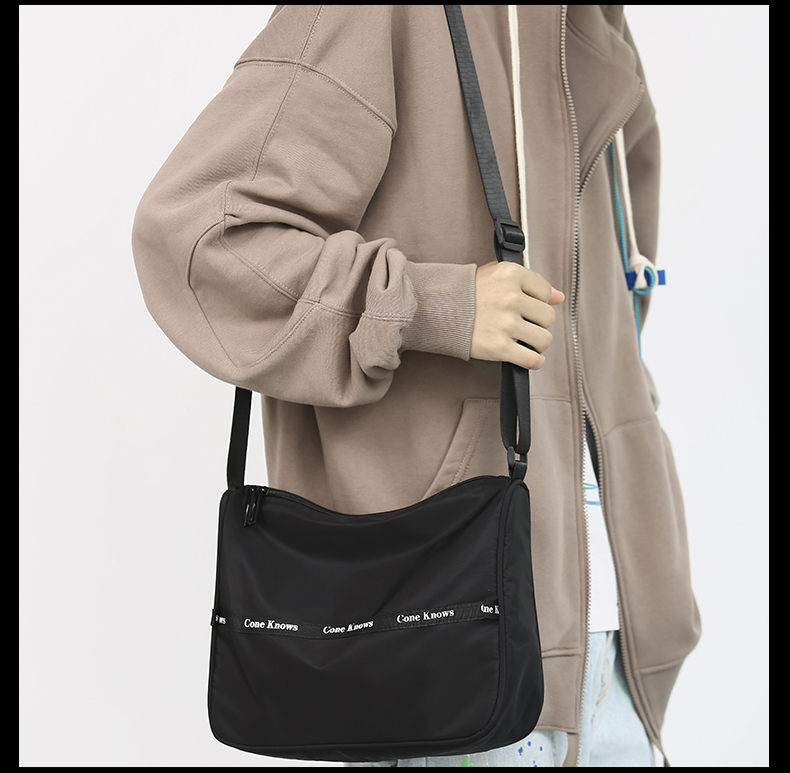 杰瑟(jiese)斜挎包男女休闲尼龙斜跨背包简约百搭邮差单肩包学生街头