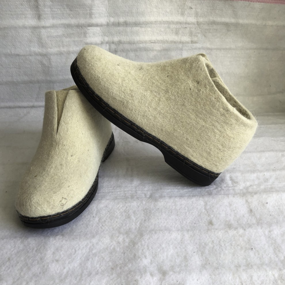 俄罗斯羊毛毡靴蒙古东北一体成型纯羊毛毡嘎达毡靴羊毛男女士毡靴品质