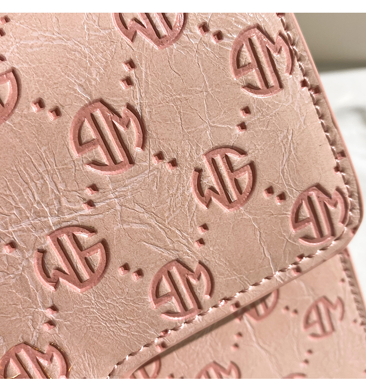 香港mackjhosel真皮压花粉色少女手提包包2022新款潮流时尚百搭斜跨包