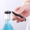 Lekoman German quality black and white evaporated milk can opener with magnet thickened three-flower evaporated milk can opener beer starter coconut milk opener 1 piece (with magnet)