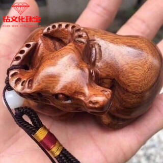 The same type of huanghuali wood handle piece carved by fat donglai for the year of the ox and the luck of the ox. handmade solid wood carvings for playing with the twelve zodiac signs. crouching ox (7cm*4cm)