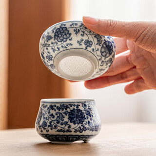 Tangfeng all-ceramic one-piece tea drain blue and white filter household ceramic kung fu hand tea partition simple tea filter blue and white lotus tea drain