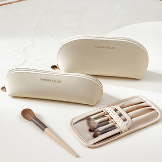 Na-shaped cosmetic bag, new high-end makeup brush, women's portable storage bag, high-end travel waterproof carry-on toiletry bag, beige
