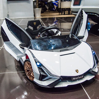 Cute smiling gull lamborghini children's electric car four-wheeled with remote control car for men and women, baby and child can sit on toy car stroller, top with white + full function + leather seat four-wheel drive foam wheel