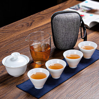 Yu shang zhenpin outdoor travel kung fu tea set portable bag type high-end ceramic tea drinking cup cover bowl quick cup 7-piece set 4 tea cups 1 fair cup 1 tea strainer 1 pack