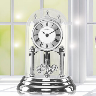 Seiko japan seiko clock fashion personality fashion table clock rotating pendulum bedroom living room office glass desk clock silver qhn006s