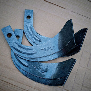 245 model blade, one blade tops eight blades with reinforced ribs. imported manganese steel rotary tiller blades are thickened. a. 245 model (one blade tops nine blades), about 60 blades. double-sided reinforcement (high-quality original knife).
