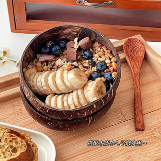 Badger yogurt bowl with spoon wooden dessert fruit salad home breakfast oatmeal natural coconut shell bowl