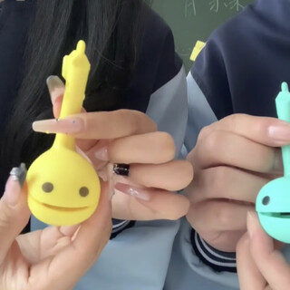 Vitality and fun electronic tadpole toy pendant, weird gadgets, abstract, funny, creative, soundable electronic musical instrument, yellow electronic tadpole musical instrument