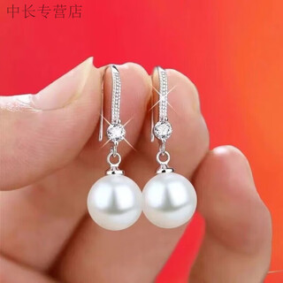 He jiagong lao phoenix new fashion versatile simple 2025 sterling silver 9999 silver earrings women's style pearl ear hook white silver ear hook pearl same style
