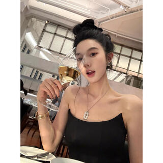 Ouyang fishbone breast pad integrated outerwear shirt women's autumn new design niche hot girl sleeveless top black s