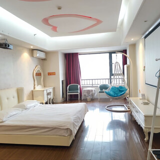 Giant screen movie viewing king bed room