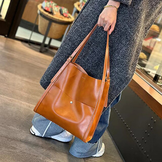 Japanese tote bag women's large capacity 2025 spring and summer new commuting genuine leather women's bag bucket bag versatile cowhide shoulder sunset yellow
