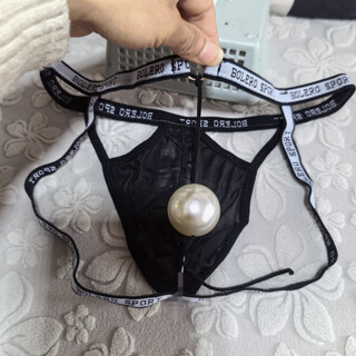 He jiagong men's underwear with 4 cm big beads hanging on the back, personalized play style, sexy thong, transparent butt-exposing macho underwear, transvestite, black