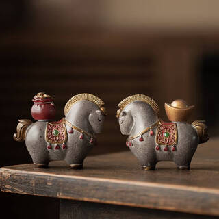 A pair of magical tea pets that will make you rich soon. chinese style tang horse tea table that attracts wealth and can raise tea sets and tea tray accessories. you will soon be blessed and rich. a pair of them - temperature sensitive color change