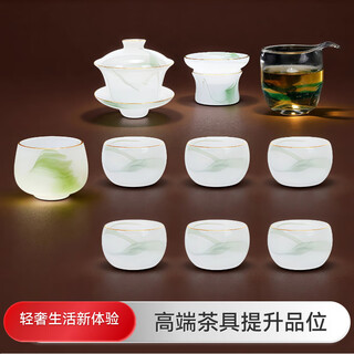 Richunliu high-end gold-painted kung fu tea set set with jade porcelain lid bowl emerald glass high-end office gift box light luxury emerald green gilt jade porcelain tea set large t crystal male cup 11 pieces