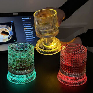 Fantasy luminous rotating wine glass rotating decompression wine glass tumbler rotating cup bark style comes with a luminous coaster