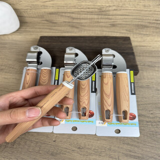 Yusenyi order kitchen stainless steel garlic press, small, labor-saving and practical, wood grain handle garlic pounding artifact, as shown in the picture