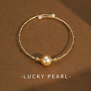 I am lucky enough to have the south sea gold pearl bracelet 10-11mm large particles 18k adjustable elastic steel ring as a versatile gift for my girlfriend south sea gold pearl 10-11mm