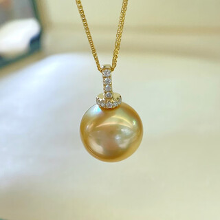 Dushen 12-13mm south sea gold bead pendant 18k set with diamonds nearly perfect round shape with slight imperfections. pre-sale. 10 days delivery with silver chain.