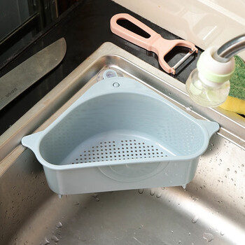 Jimeng kitchen sink triangular drain basket suction cup washbasin filtered water storage rack washbasin rag storage hanging basket blue
