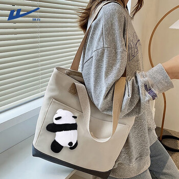 Pull back bags for women 2024 new portable canvas bag commuting large capacity shoulder bag casual versatile college student class bag off-white canvas bag + white panda pendant