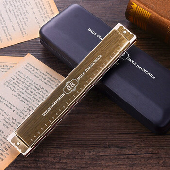 Swan german imported gongs swan 28-hole high-end adult professional performance level polyphonic c key performance harmonica light color 28-hole polyphony