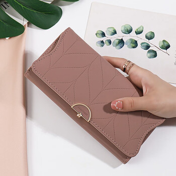 Woodpecker (tucano) spring new wallet women's niche design 2024 new simple folding long wallet small fresh bean paste color