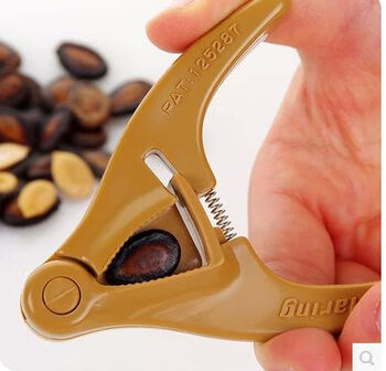 Qian qihezheng pine nut pliers for peeling melon seeds, a magic tool for peeling melon seeds, nut clips to open melon seeds, lazy people to eat sunflower seeds, watermelon seeds, plastic melon seed peeling pliers