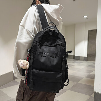 Xiaohanxiang 2025 new large-capacity schoolbags for boys and girls, junior high school students, high school students, double backpacks, tie-dye dark pattern backpacks, black little monkey heads