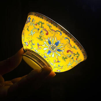 Jingniang jingdezhen ceramic imperial yellow enamel twisting lotus tall anti-scalding design high-looking rice bowl palace style imperial yellow 4.5-inch tall bowl