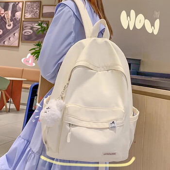 Yukdati schoolbag female junior high school student backpack high-value backpack casual versatile large capacity japanese simple backpack white with pendant
