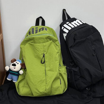 Kuang rui schoolbag junior high school student good-looking large capacity high school student computer backpack backpack travel lightweight mountaineering bag green (with striped puppy pendant)