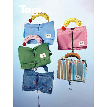 Tagi.hadou egg roll waterproof cosmetic bag detachable hanging toiletry bag storage bag new year gift-denim newspaper