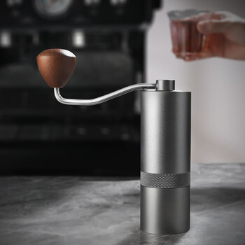 Mongdio bean grinder hand-cranked coffee bean grinder household small coffee grinder cnc hexagonal steel core black