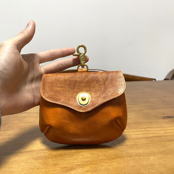 Goyn genuine leather small bag, retro key bag, vegetable-tanned first-layer cowhide storage bag, card bag, coin purse, men's and women's headphone bag, small size