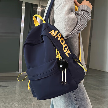 Yaying high-looking boy schoolbag 2025 new junior high school student backpack female high school student college student ins travel backpack blue logo letter pattern random black fur ball large size