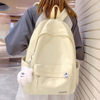 School bag for junior high school girls, good-looking ins large capacity backpack, high school student backpack, waterproof, stain-resistant, lightweight and simple, yellow, shipped from jingdong warehouse, next day delivery, comfortable shoulder straps/inner compartment/cute pendant