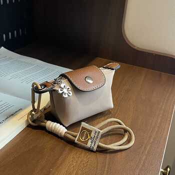 Bu chao meow coin purse mini small dumpling bag 2025 new storage small portable headphone bag keychain gift pendant bag khaki