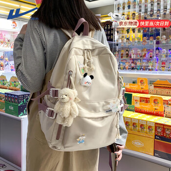 Warrior schoolbag for women, good-looking, large-capacity, middle and high school student backpack, cute girl backpack, new college student computer bag, white, with backpack bear pendant + badge
