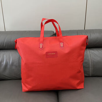 Winter quilt core quilt storage bag, enlarged and thickened packaging bag, metal buckle silk quilt four-piece handbag, red large size (for autumn 6 pounds of silk quilt)