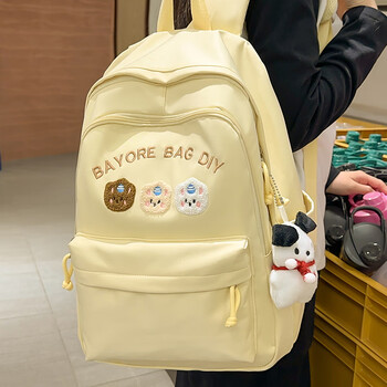 Kuang rui schoolbag female junior high school student good-looking elementary school student 3-6 grade backpack high school large capacity 2025 new backpack yellow (with pacha dog pendant)