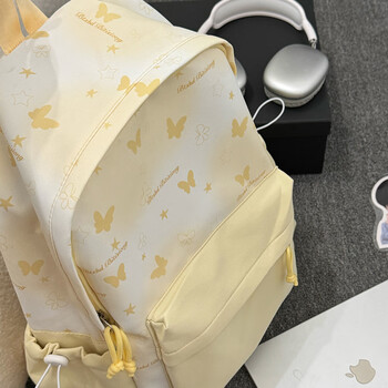 Zinke schoolbag junior high school girl high-profile butterfly blooming large size backpack large capacity high school college student backpack yellow large (student schoolbag)