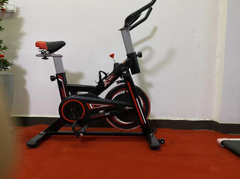 Jianzhimei new new model supply dynamic bicycle home fitness equipment silent exercise bike indoor sports 709 red naked bike + bluetooth app + bluetooth audio