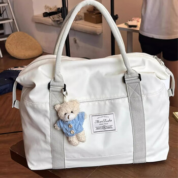 Xingxi travel bag women's large capacity portable luggage bag travel bag clothing storage large bag men's boarding bag short-distance maternity bag gardenia white portable travel bag does not include pendants